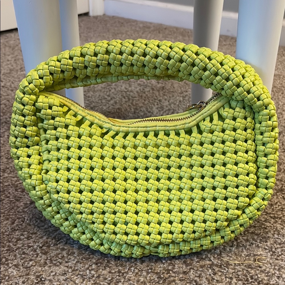 Sincerely Jules vegan leather woven handbag.